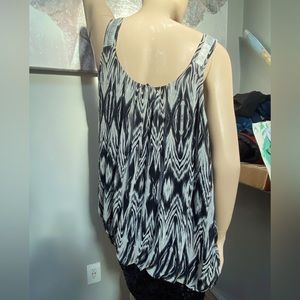 Silver sequin strapped dressy tank.